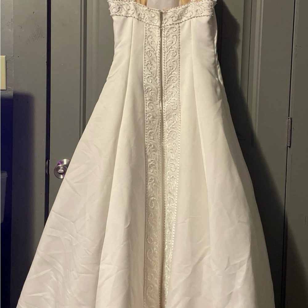 Elegant White Gown with Embroidered Details